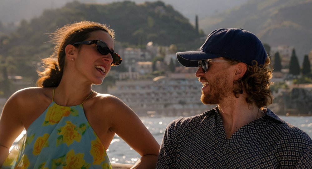 Guests enjoying a boat experience on the Sicilian coast