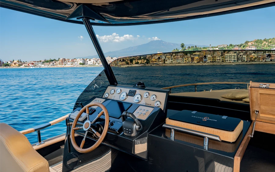 Helm and shaded cockpit of the Positano 38 Open